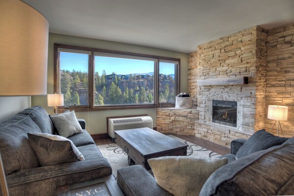 Comfortable Living Room with Sleeper Sofa, Fireplace, TV, Views