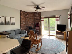 The livingroom on the ground floor and the breakfast counter in the foreground.
