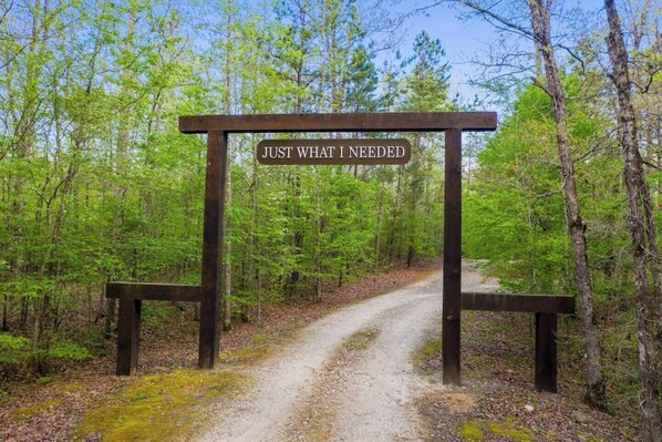 Huge gateway entrance. Property is not visible from the road.