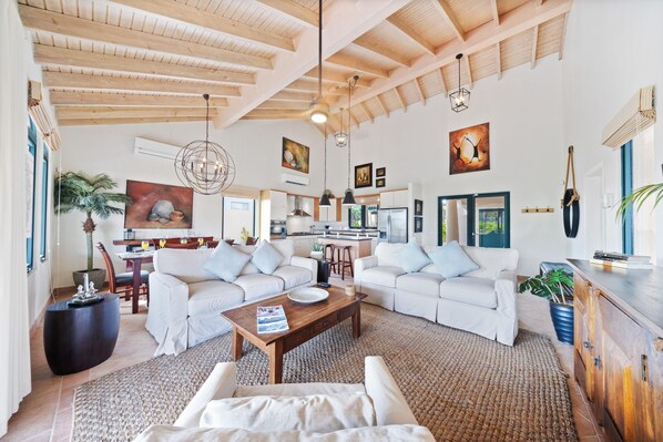 Relax in this spacious villa, perfect for families and groups, with open living spaces and comfy seating for all-day enjoyment.