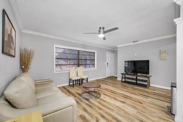 Spacious Living Area with TV