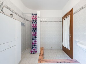 Flooring, Wall, Floor, Interior Design, Plumbing Fixture, Bathroom, Tile, Plumbing, Composite Material, Room