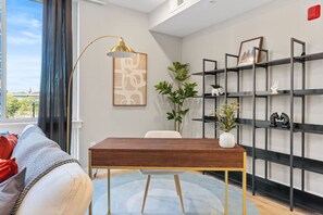 Dedicated workspace: The unit offers a desk exclusively for work, complete with a comfortable chair for added convenience.