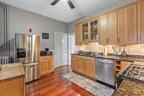 Fully equipped kitchen with stainless steel appliances