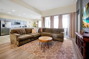 A comfortable and inviting living room with plush seating, perfect for gatherings or cozy evenings in.
