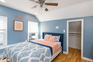 Get some R&R in this primary second floor bedroom with room darkening shades and a smart TV.