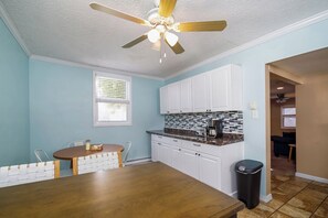 Enough for 6 to enjoy dinner in the kitchen and dining area