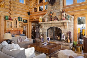 Main level sitting area with large gas fireplace