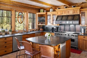 Large chef's kitchen with light, airy feel