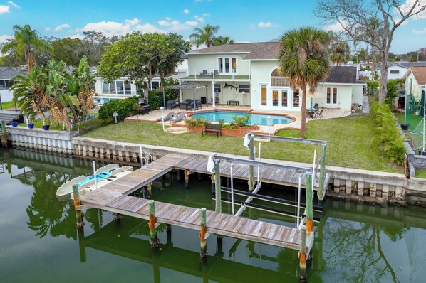 Embark on kayak adventures or cast a fishing line from the private dock