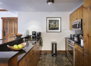 Prepare a memorable meal in our gourmet kitchen, or order in from room service.
