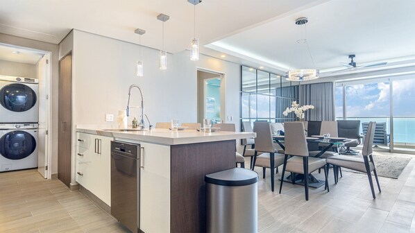 Full of comfort, the main room combines a well laid out kitchen, dining table for six, and comfortable living room.