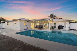 The lights in and around this pool make this space a favorite for evening hangouts!