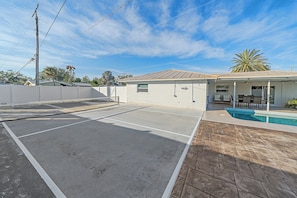 Get ready for the highlight of this home... The private backyard Pickleball Court!