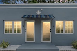 Charming modern exterior entrance.