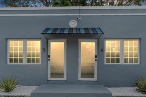 Charming modern exterior entrance.
