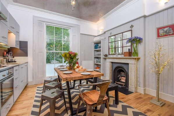 The dining room with the table converted to a smaller size.