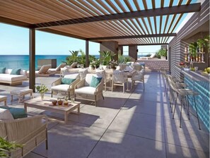 Rooftop seated lounge for enjoying a cocktail while soaking in the views.