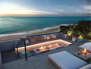Rooftop lounge with firepit to sit by and soak in the sunsets.