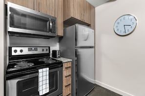 Craft tasty dishes in this contemporary kitchen with all the necessary amenities.