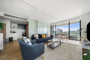 The apartment has an open plan design and is filled with lovely natural light.