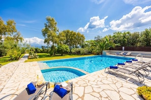 Private pool, terrace, and garden with sea views