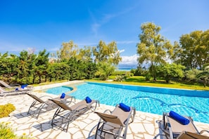 Private pool, terrace, and garden with sea views