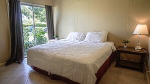 Relax in a spacious king bed crafted from two twins with cozy king-size sheets.