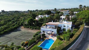 Villa and shared tennis court