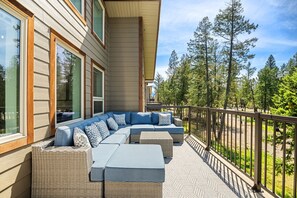 Private deck with a BBQ that overlooks the sports court.
