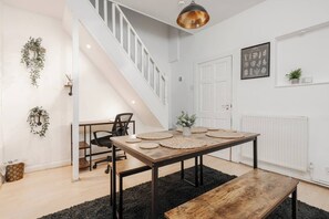 Dining Area features:
- Spacious dining table to share a meal together.
- Well-lit Workspace so you can work comfortably.

