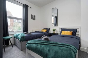 Bedroom 2:
Features:
2 x Single Beds