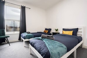 Bedroom 1:
Features:
2 x Single Beds