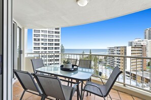 Enjoy your morning coffee in this spacious balcony overlooking the ocean/city