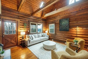 Step into this spacious and inviting living room, perfect for relaxation and gathering with loved ones.