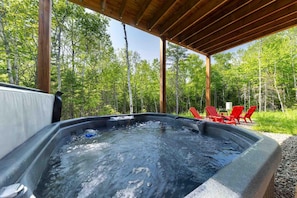 Unwind under the summer sky in the spa.