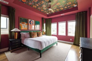 Large master suite that blends sophistication with eclectic vibes
