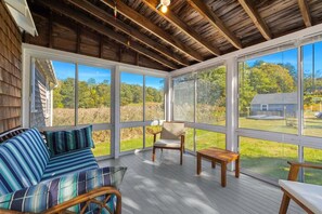 Three season room, a great place to read, drink coffee, and catch up with family