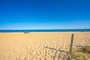 Oceanside serenity is just a short stroll away!