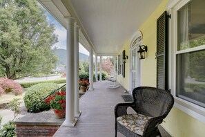 Rocking chair front porch with mountain views