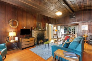 You can snuggle in for a movie with a wood-burning fire in the living room.