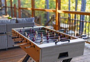 Bring out your competitive side with a friendly game of foosball on the deck while enjoying the refreshing woodland air.