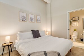 Spacious bedroom with stylish decor, perfect for unwinding after a day of exploring the local area.