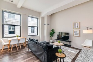 As you take a seat in the living room, the comfortable furniture and tasteful design make it easy to unwind.
