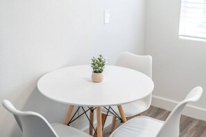 As you take your seat, the dining room's sophisticated design sets the stage for memorable meals and conversations.