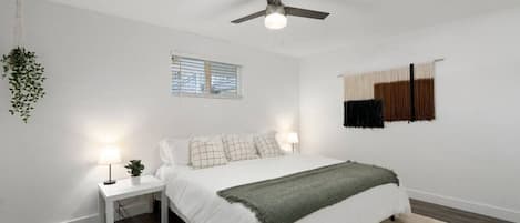 The king bedroom offers a luxurious retreat, with a bed that promises restful nights and a room that feels like a private oasis.
