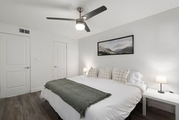 As you enter the king bedroom, the sophisticated decor and plush bedding create a space where you can truly unwind.