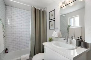 The bathroom is a private sanctuary, with a layout and features that make it the perfect place to rejuvenate.