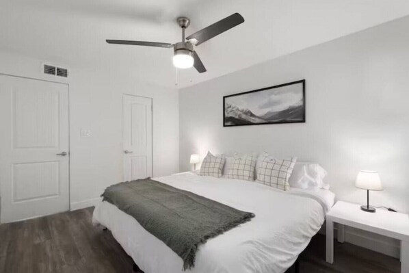 As you enter the king bedroom, the sophisticated decor and plush bedding create a space where you can truly unwind.