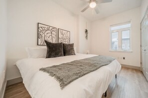 As you enter the bedroom, the comfortable bedding and peaceful atmosphere create the perfect retreat from the day.
